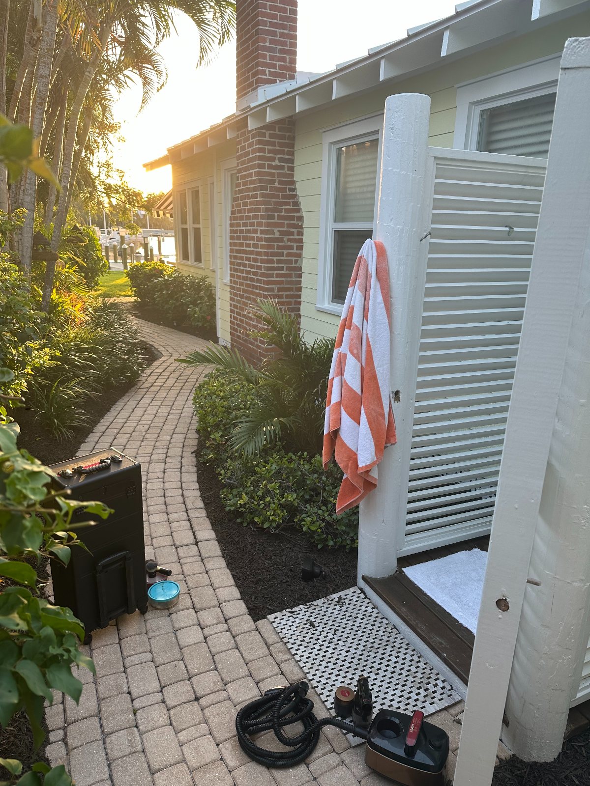 Mobile spray tan setup at a hotel pool — The Bronze Lily, St. Petersburg, FL