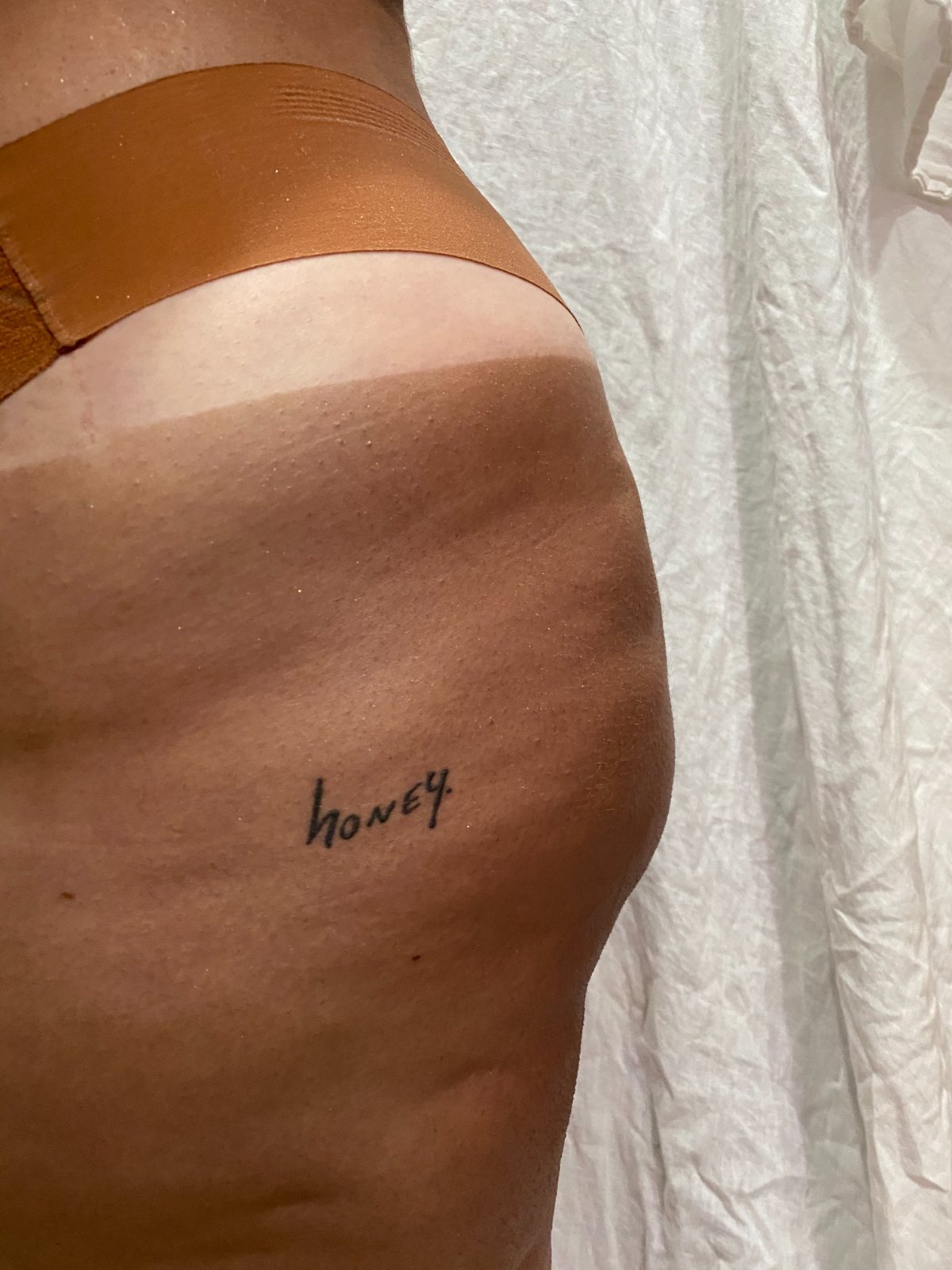 Custom airbrush spray tan result — The Bronze Lily, St. Petersburg, FL